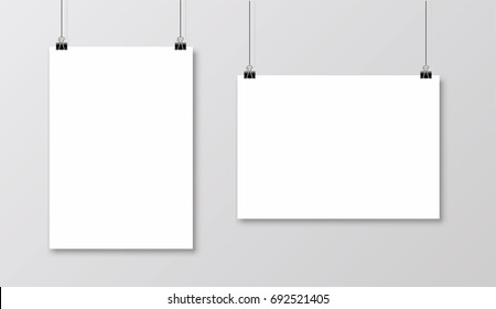 Empty A4 sized vector paper frame mockup hanging with paper clip - stock vector.