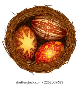 Empty bird's nest made of branches with blooming white flowers, green spring leaves and decorated holiday eggs lying in nest, design element for merry easter holiday