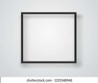 Empty black frame on a white wall. Vector template