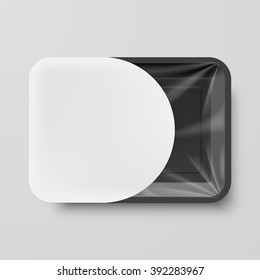 Empty Black Plastic Food Container with White Label on Gray