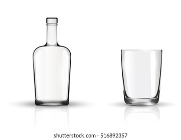 Empty bottle and glass isolated on white