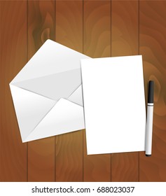 Empty card with envelope and pen on wood background. Vector mockup