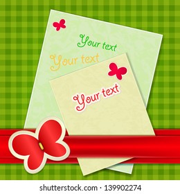 Empty card for your text on a green plaid background. The idea for congratulation with butterflies and red ribbon.