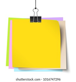 empty colored little papers with binder clip hanging at black twine