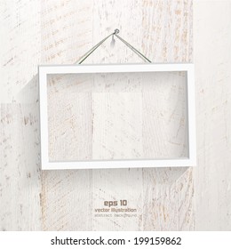 Empty frame picture on the shabby and painted wooden plank. EPS 10 vector illustration