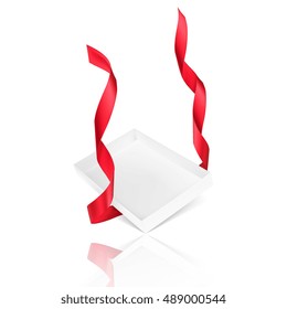 Empty gift box with red ribbon falling on an isolated white background