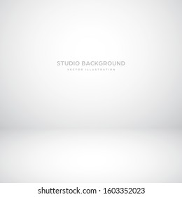 Empty gray studio abstract background with spotlight effect. Product showcase backdrop.