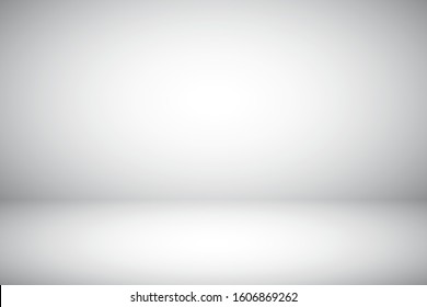 Empty gray studio abstract background with spotlight effect. Product showcase backdrop.