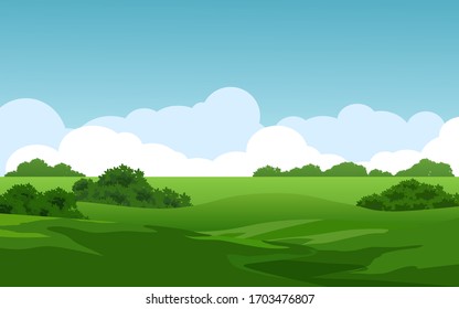 Empty green field on sunny day