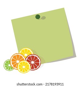 empty green note paper with citrus fruits and juice