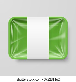 Empty Green Plastic Food Container with Label on Gray Background