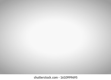 Empty grey blurred background with radial gradient. White studio room backdrop