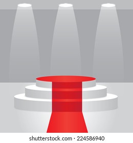 Empty illuminated podium with red carpet