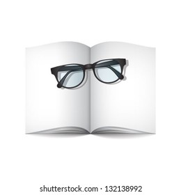 empty journal and glasses