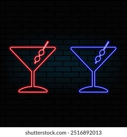 Empty martini glass on a pink and blue neon background. Alcohol drink, cocktail party concept. Transparent silhouette, illuminated effect. Night bar.