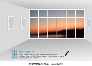 Empty modern lounge area with large bay window and view of sunset