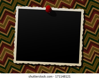 Empty photo frame over a knitted background