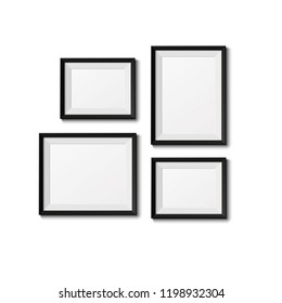 Empty Photo / Picture Frames Set On White Wall