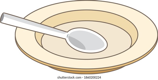 Empty plate. A spoon in a plate. Kitchen appliances.