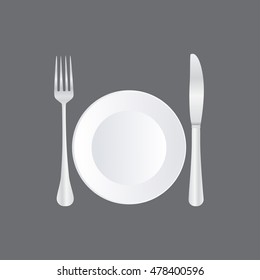 Empty plate with spoon, knife and fork