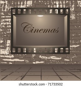 Empty publicity board with illumination made in the form of a photographic shot against a gray wall