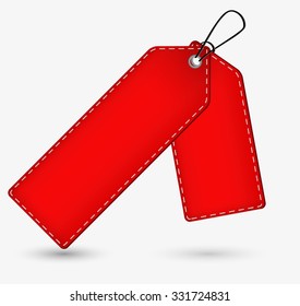 empty red price tag with shadow on gray background