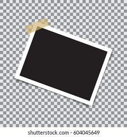Empty retro photo frame with sticky tape on a transparent background