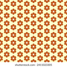 Empty round circles in orange and yellow creating a pattern.