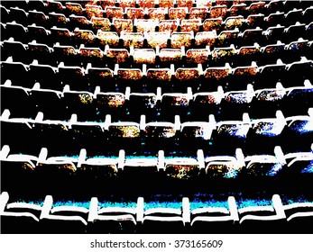 Empty rows of theater or movie seats.