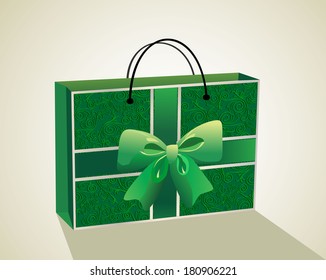 Empty shopping green bag with tied ribbon.