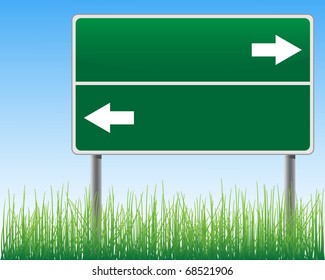 Empty signpost on sky background with arrows grass below.