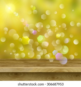 Empty table of light brown wooden planks on autumn background with sun and glares