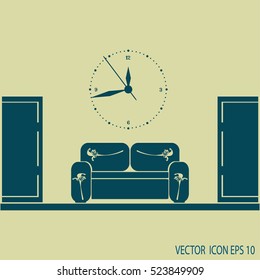 Empty waiting room sofa in front of the door and a clock on the wall