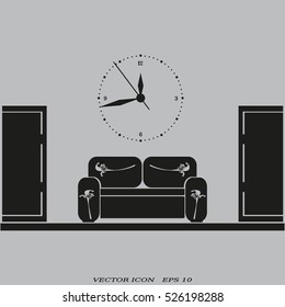 Empty waiting room sofa in front of the door and a clock on the wall