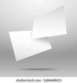 Empty white paper sheet on grey background