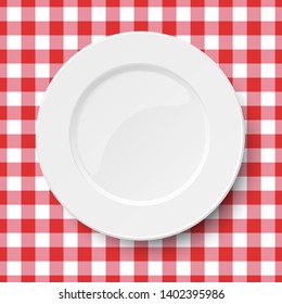 Empty white plate placed on a kitchen table cloth seamless background of classic red colors. Vector illustration.