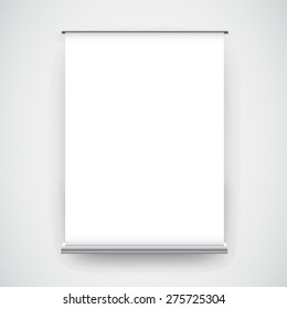 Empty white roll up banner display on wall background