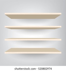 Empty wood shelves on light gray wall background