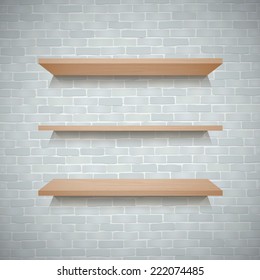 Empty wooden shelf for exhibit on brick wall texture background.
