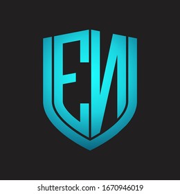 EN Logo monogram with emblem shield design isolated with blue colors on black background