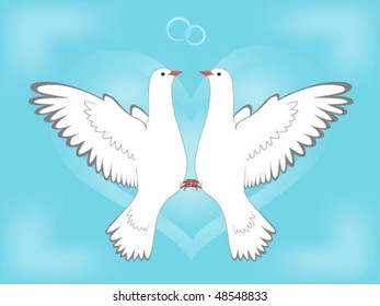 Enamoured pair of pigeons flying to the sky against heart and rings