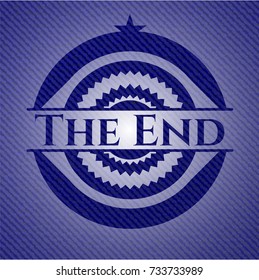The End badge with denim background