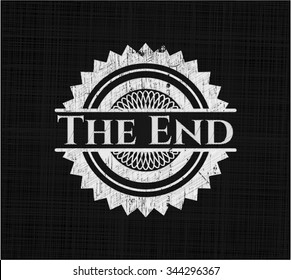 The End chalkboard emblem on black board