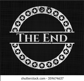The End chalkboard emblem on black board