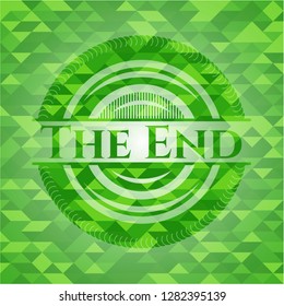 The End green emblem. Mosaic background