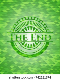 The End green emblem with triangle mosaic background