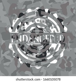 Endangered on grey camo pattern