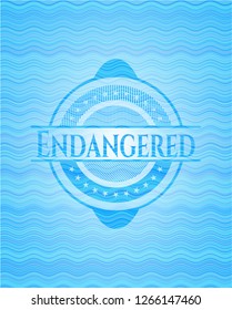 Endangered water representation badge.