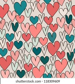 Endless bright abstract love pattern. Cute cartoon backdrop with hand drawn hearts. Textile surface texture.