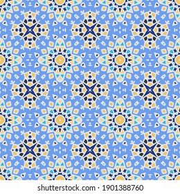 Endless colorful mandala pattern in blue yellow  for wallpapers, design and backgrounds, vector seamless pattern.